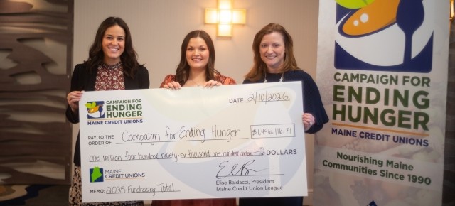 Maine CU leaders with check